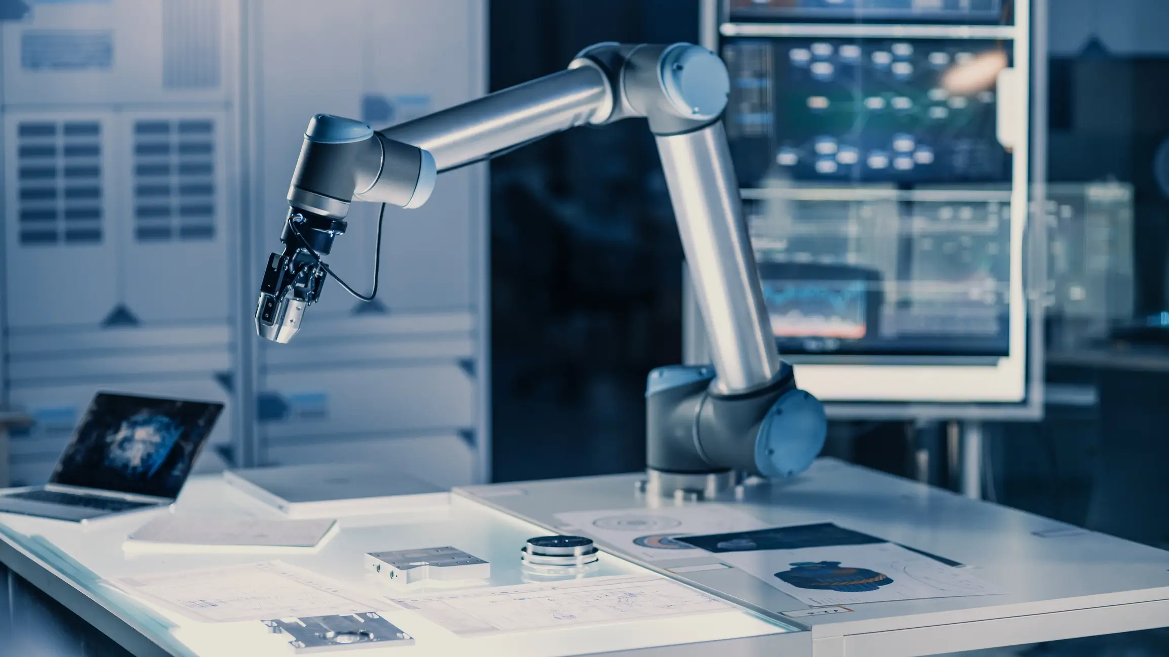 Industrial robotic arm operating in an advanced AI-enabled manufacturing environment